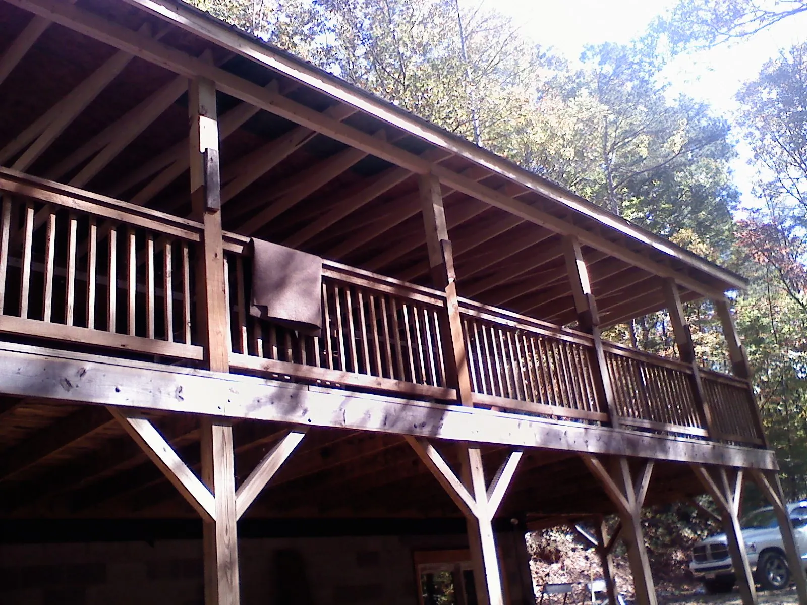 Timber framing under a new elevated porch and deck — Roof Leak Repair in Gatlinburg by Roofing Brothers